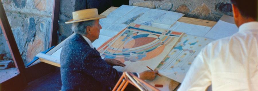 Frank Lloyd Wright at his drafting table