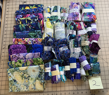 Stash Box of Blue Green and Purple Scraps and Fabric